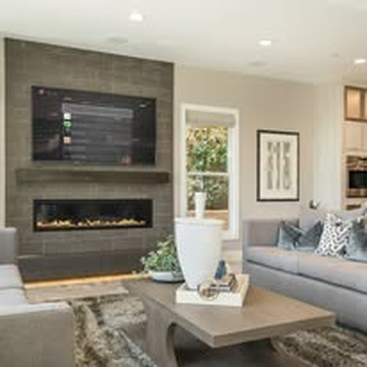 Living room TV and in-wall speakers with hidden wiring